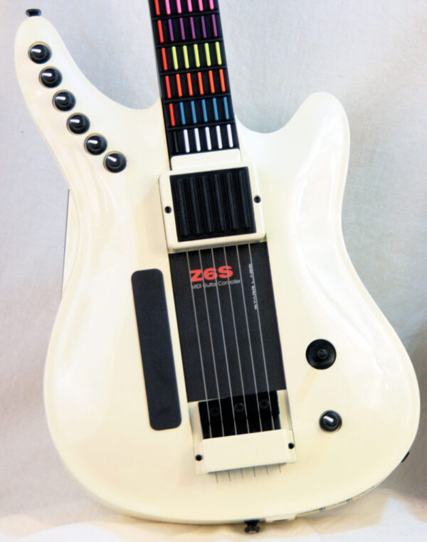 close up white Z6S-DLX-5 midi guitar with strings and ribbon controller